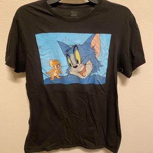 Tom and Jerry cartoon T-shirt. Sized as medium but fits more like a small